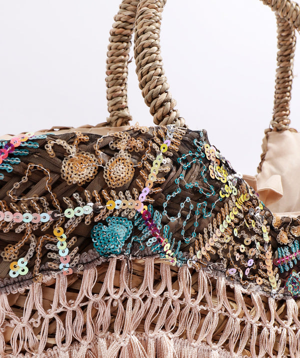 Close Up View: Natural Straw Beach Basket with Sequin Detailing