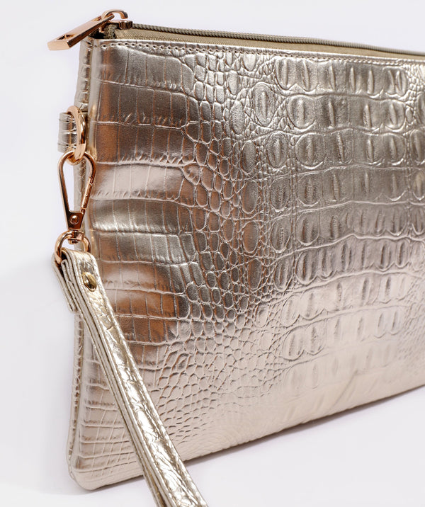 Close Up View: Gold Metallic Clutch with Zipped Closure and Interior Pockets