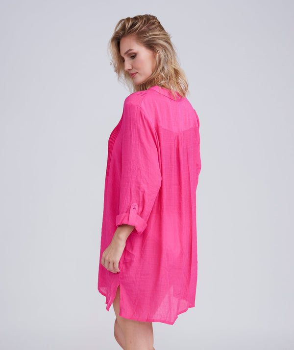 Back View: Hot Pink Fringed Beach Shirt with Button Closure and Rolled Cuff Sleeves