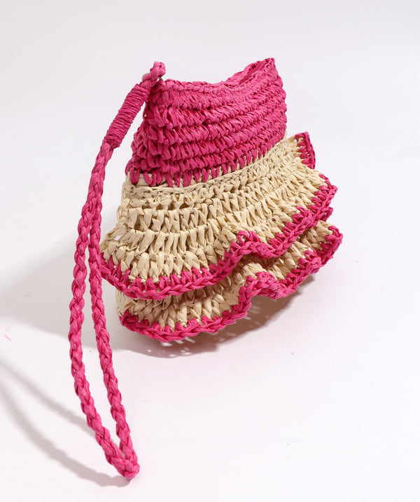 Side View: Sand and Hot Pink Woven Straw Clutch Bag